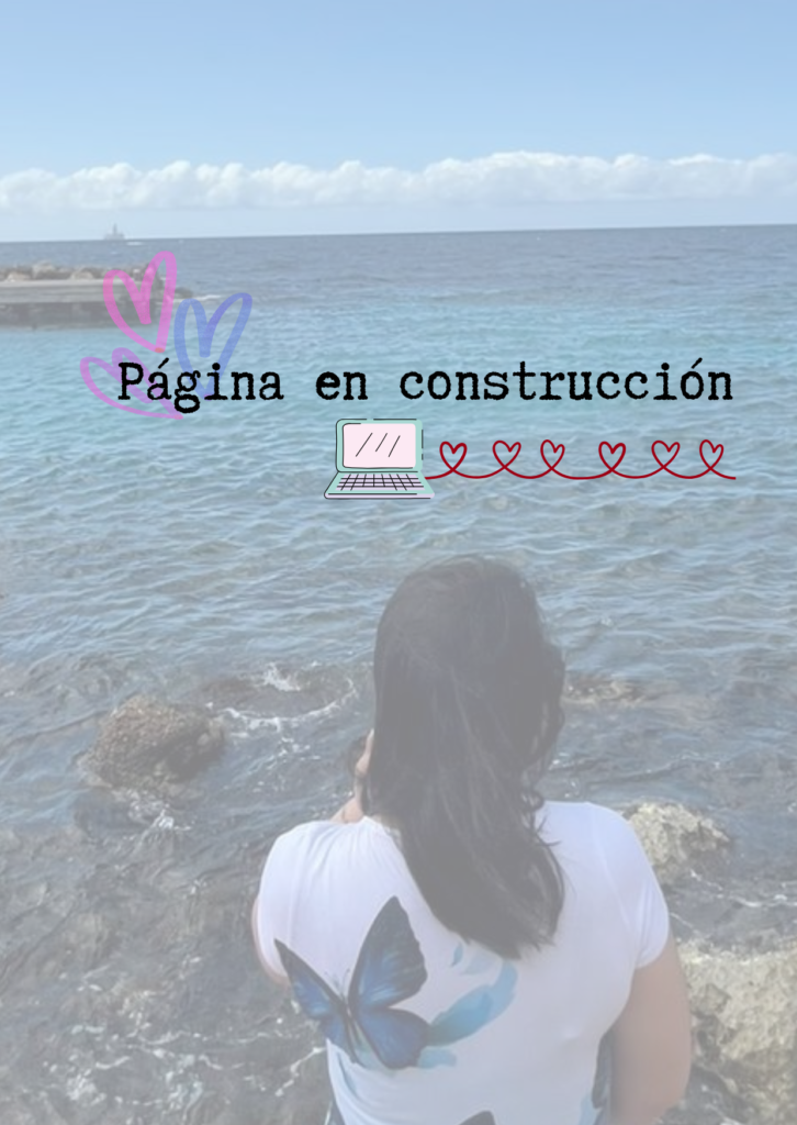 Página en construcción. Diana mirando el mar de Curazao. Corazones y computadora
